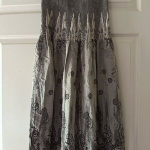 Multi purpose item: halter dress; skirt.